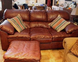 Brown leather sofa with ottoman