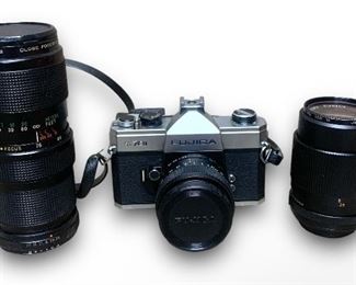 Vintage Fujica ST701 SLR 35mm Film Camera w/ A Vivitar 75-205mm 1:3.8 Macro Focusing Zoom Lens, A Accura Diamatic 1:3.5 f=135mm Lens, and A Fujinon 1:1.8 f=55mm Fuji Photo Lens
