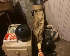 One Bowling Ball, Bowling Bag, Bowling Pin, Bowling Shoes, Set of Golf Clubs, and Tees (table, golf balls, and tees and one bowling ball are sold)