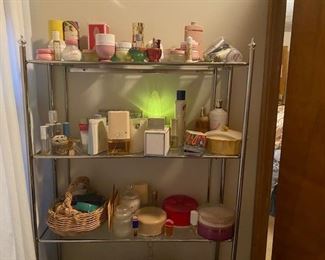 Top shelf is Avon Bottles, Second Shelf is Perfumes, and Third Shelf is Soaps and Powders (located in master bath)