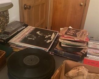 Vinyl  Records Albums, 45, and 78, Cassette tapes, CD's and Omitech DVD player shown front right silver box 