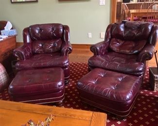 Hancock and Moore Vintage leather tufted club chairs with ottomans