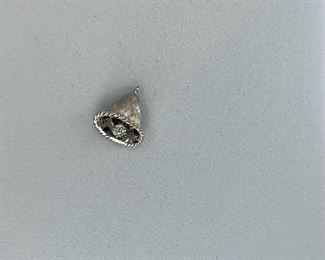 14K White gold bell shape with diamond. 1.40 gr --- $85.-