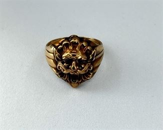 10K yellow gold with man head shape ring with rubies in the eyes and mouth. 8.10 gr --- $325.-