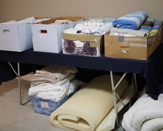 more bedding, towels and foam mattress toppers