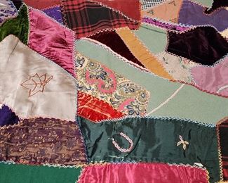 Amazing selection of handmade quilts and quilt tops, including this crazy quilt. 