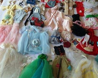 Large selection of vintage Barbie Dolls, and accessories, including Cinderella, Red Riding Hood, and Wedding Day vintage outfits.