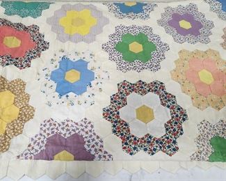 Amazing selection of handmade quilts and quilt tops.  Grandmothers Garden measures 94x76.