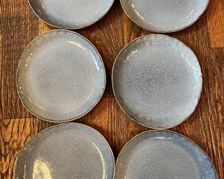 Blue speckled plates. Each is a little different. 