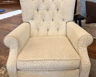 Leopard spotted chair. Has been newly recovered. Also, is a recliner.