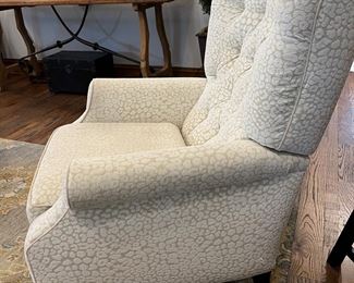 This is a side view of the leopard spotted chair