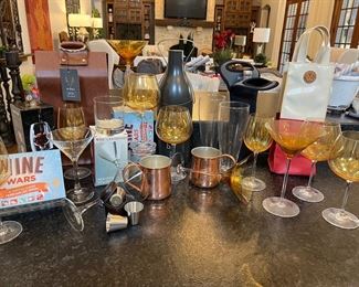 Bar ware! William Sonoma copper mugs with tags still on. Lots of beautiful Pier One gold wine glasses, martini glasses, red wine glasses. Tori Burch wine bag,&  2 NEW wine games. 