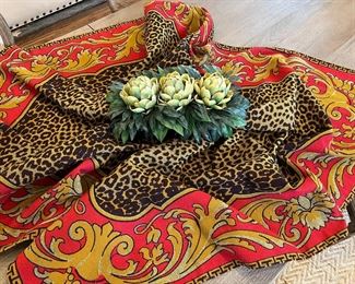 Tasteful leopard and red/gold bordered tablecloth!