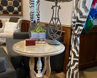 There are a pair of these lamps. Great little accent table.!