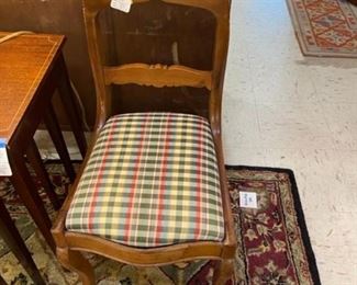 One of four antique chairs