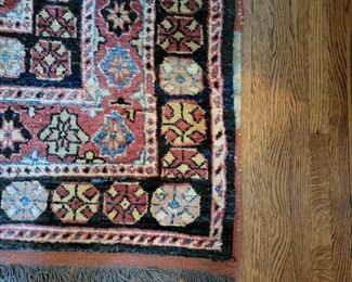 Close up of rug in living room.