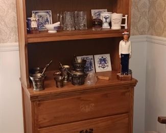 Hutch. Cookie jars, collection of morter and pestles