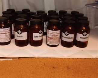 Empty Amber drug jars, blue cake stand and server