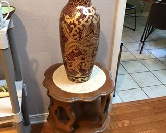 Mid century revolving table with Chinese vase