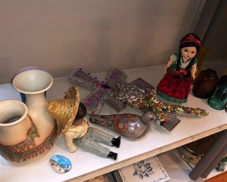 Vintage dolls, and Mexican pottery collection and glass vintage bottles