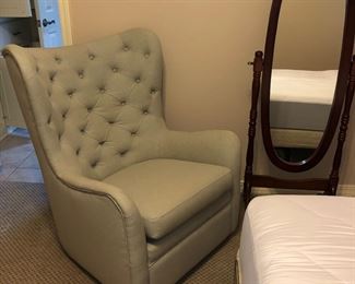 Tufted, swivel/ rocking  chair, like new