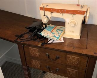 Vintage sewing machine and cabinet works