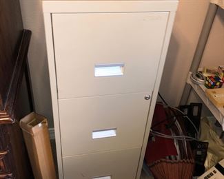 Filing cabinets, typewriter, adding machine