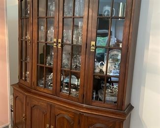 Beautiful China cabinet full of fun dishes
