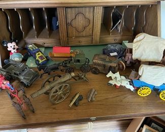 Cast iron toys, cannons, and more