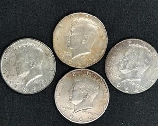 Four 1964 Kennedy Half Dollars