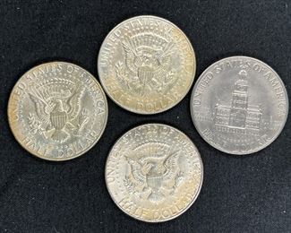 Four 1964 Kennedy Half Dollars