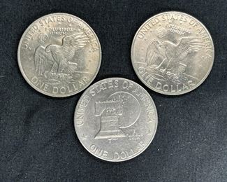 Three Eisenhower Silver Dollars