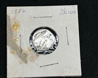 1886 Seated Liberty Half Dime with hole