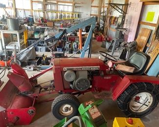 GT 14 tractor model 1–7441 with snowblower,lawn mowing deck,
Three point hitch