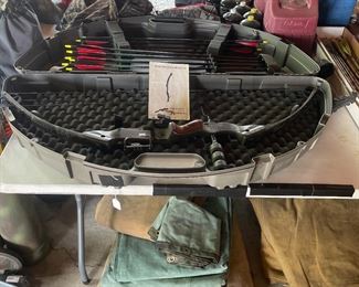 High country safari compound bow with quiver arrows in case.