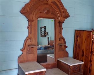 You will need a nine foot ceiling to handle this handcrafted walnut dresser with with glove boxes, mirror and marble. It was made on this farm!