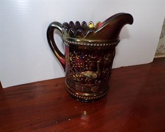 Few pieces of carnival glass. Peacock