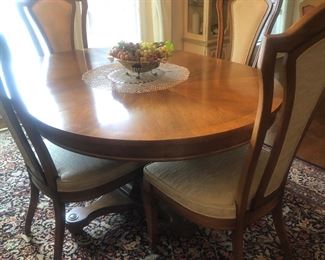 6 chair dining room table with 2 leafs and custom table pads