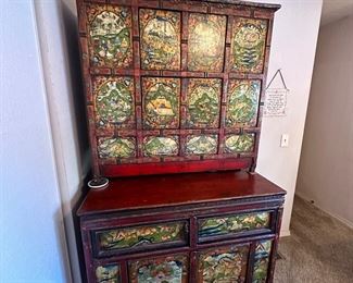 Two tiered antique Tibetan cabinet