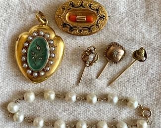 Item 47a: Circa 1880 18K, Seed Pearl, Jade & Diamond Locket (far left): $1495 Item 47b: 10K Stick Pin with Seed Pearl: $50 Item 47c: 14K Stick Pin with Diamond: $50 Item 47d: 10K Stick Pin with Oyster: $50 Item 47e: Pearl & 14K Bracelet (bottom): $75