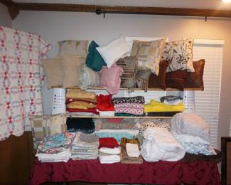 quilt, blankets, sheets, towels, pillows, curtains