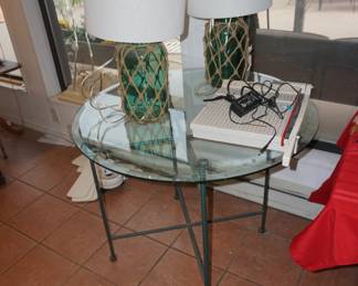 glass top table, lamps, paper cutter