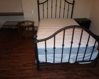 iron bed and tables
