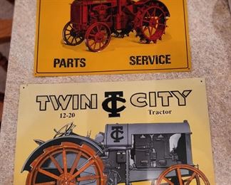 Tin and cardboard signs