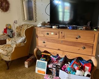 Pine dresser, TV, vintage toys, wingback chair