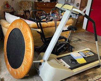 Exercise equipment.  Treadmill, exercise bikes, trampoline,  weight bar and weights