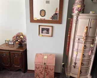 Variety of cabinets and end tables. 