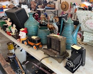 Vintage Cast iron banks, cameras, pottery, Christmas dish collection , typewriter in case Remington noiseless 
