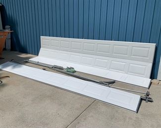 16 X 7 Aluminum Overhead Garage Door. Working fine before we took it down. Comes with side rails, wires and pulleys, spring, top rail, and installation hardware. 
