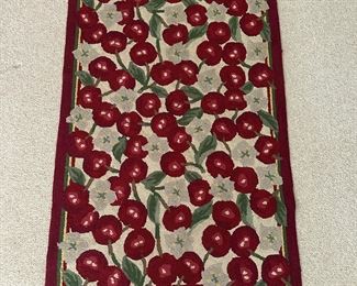 Two Cherry rugs: 30.5” x 55” and 20.5” x 30”